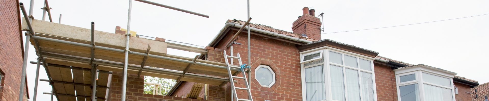Expert roof renovation and maintenance on a modern townhouse in Strathavon