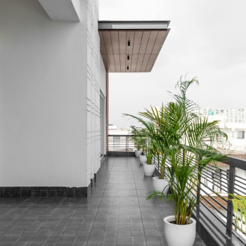 Waterproofing and sealing work on an outdoor residential patio area